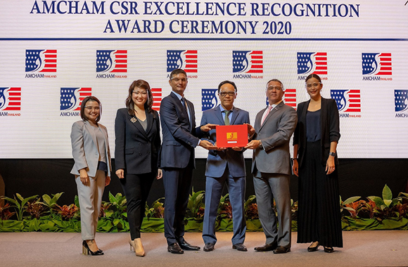 Cigna receiving AMCHAM CSR Excellence Recognition Award 2020
